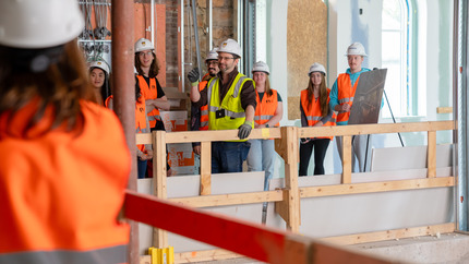 Class of 24 tour the UC under construction